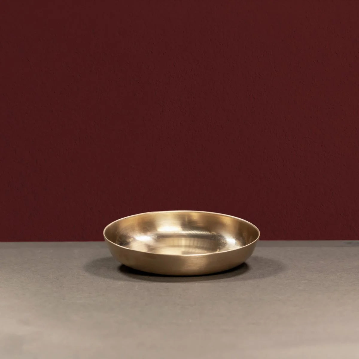 Handcrafted Kansa Snack Plate in a slightly slanting position-Zishta Traditional Bronze Serveware