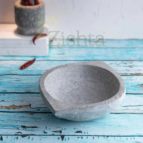 Soapstone Kalchatti Kadai on a blue wooden surface-Zishta Traditional Cookware