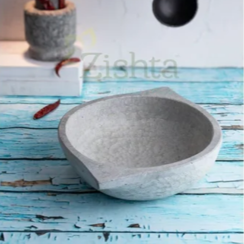 Soapstone Kadai on a light blue wooden surface with a white background-Zishta Traditional Cookware