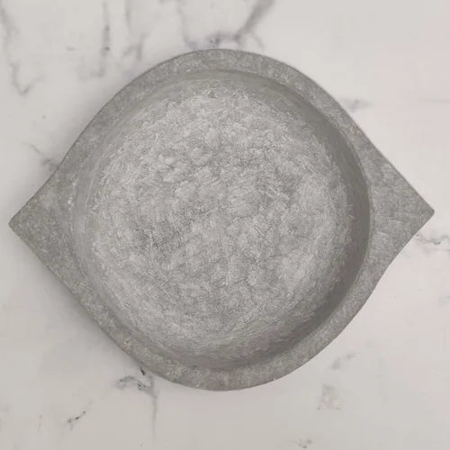 Soapstone Kalchatti kadai on a marble surface-Zishta Traditional Cookware