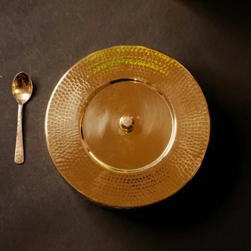 Traditional Brass Spice Box with a spoon on a dark background-Zishta Traditional Food Storage Containers
