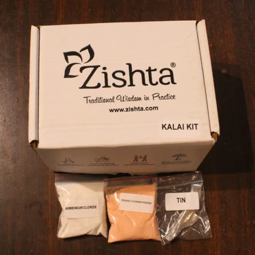 Zishta Kalai Kit packaging with three labeled bags on a wooden surface