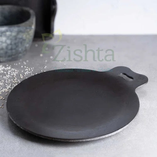 Pure Iron Dosa Tawa on a gray surface-Zishta Traditional Cookware